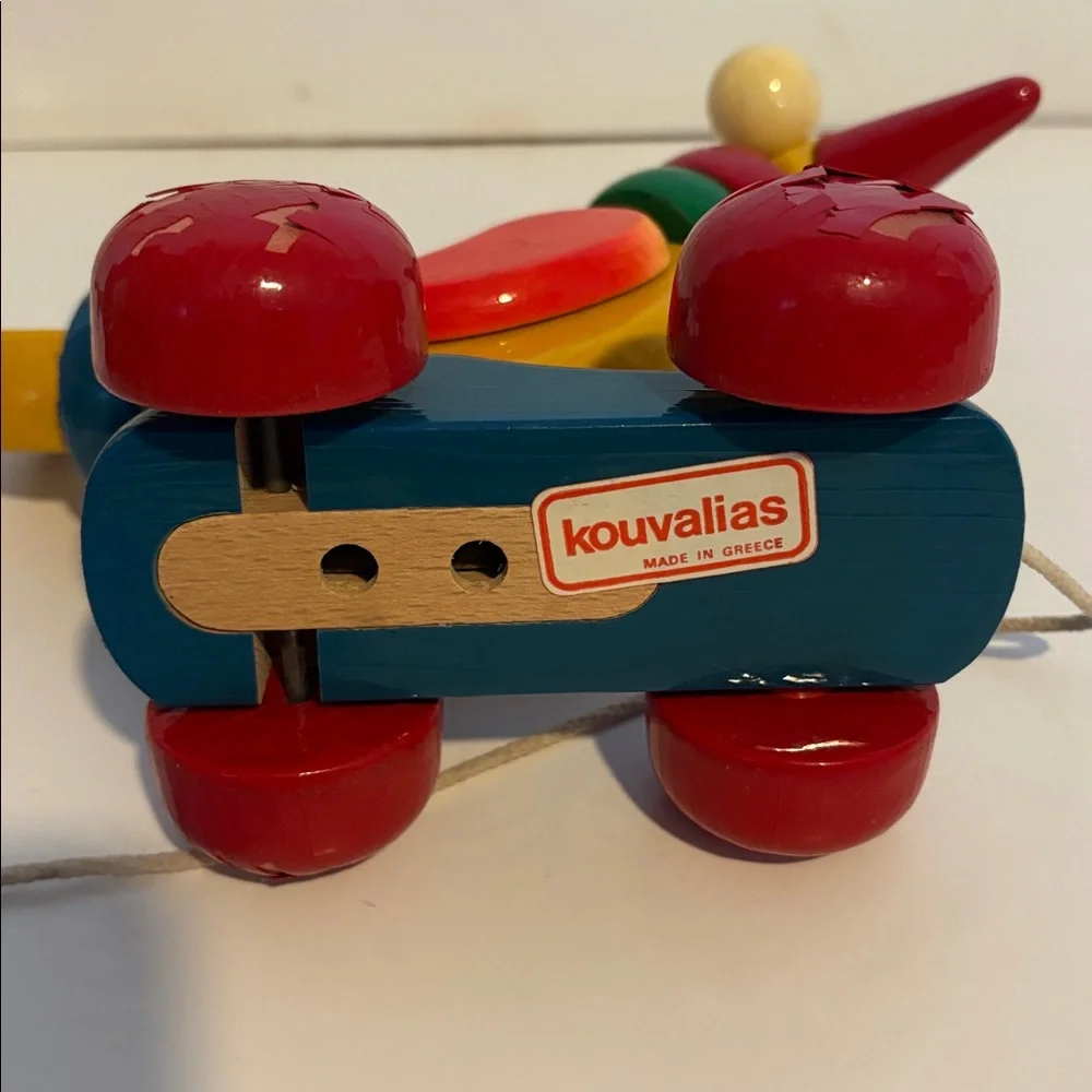 Vintage Kouvalias exotic bird Pull Toy 1990s